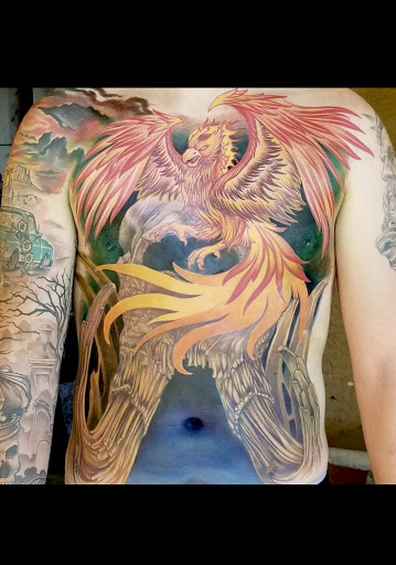 Explore piston tattoo ideas, creative tattoo ideas in Peoria, available at Iron Key Tattoo Studio Inc.