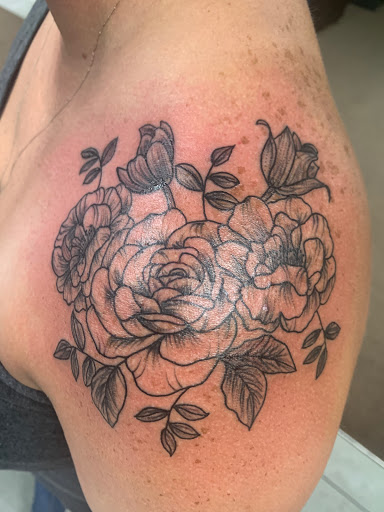 Find harley quinn and joker tattoo ideas for your next unique tattoo in Foley at Symbolic Ink Tattoo Studio