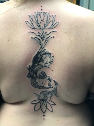 Explore small one piece tattoo ideas, creative tattoo ideas in Greenfield, available at Tattoos In Time Studio