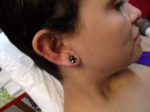 Explore golden retriever tattoo ideas, creative tattoo ideas in Elko, available at Tom Custom Tattoos and Body Piercing Studio