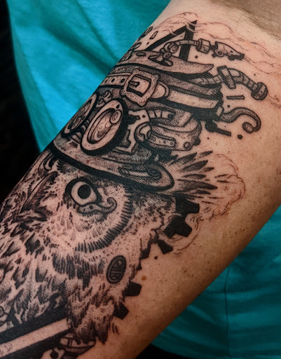 Explore women's quarter sleeve tattoo ideas, creative tattoo ideas in Tea, available at Red Arbor Tattoo