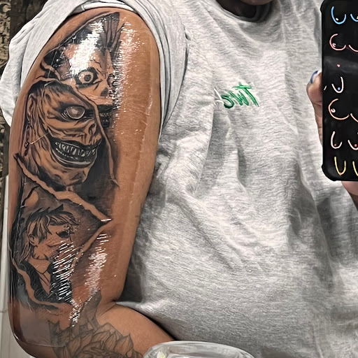Explore flash tattoo ideas for guys, creative tattoo ideas in Grovetown, available at Art Collective Tattoos & Piercings