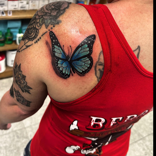 Explore the 1975 tattoo ideas, creative tattoo ideas in Hudson Falls, available at ALTERED ADDICTION TATTOOS