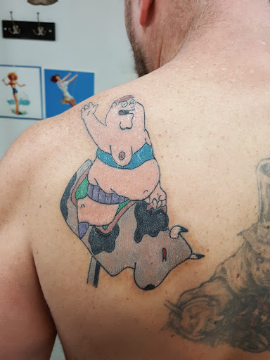 Explore hand tattoo ideas for man, creative tattoo ideas in Louisville, available at Creative Ink Tattoo Studio