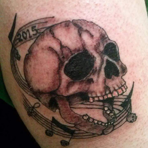 Explore tattoo ideas for a dad, creative tattoo ideas in Covington, available at Cupid Slave Tattoo Company