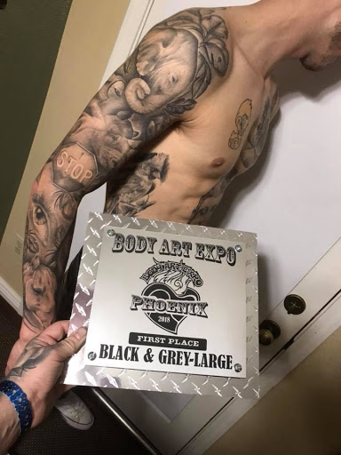 Explore man hand tattoo ideas, creative tattoo ideas in Denver, available at Nocturnal Tattoo