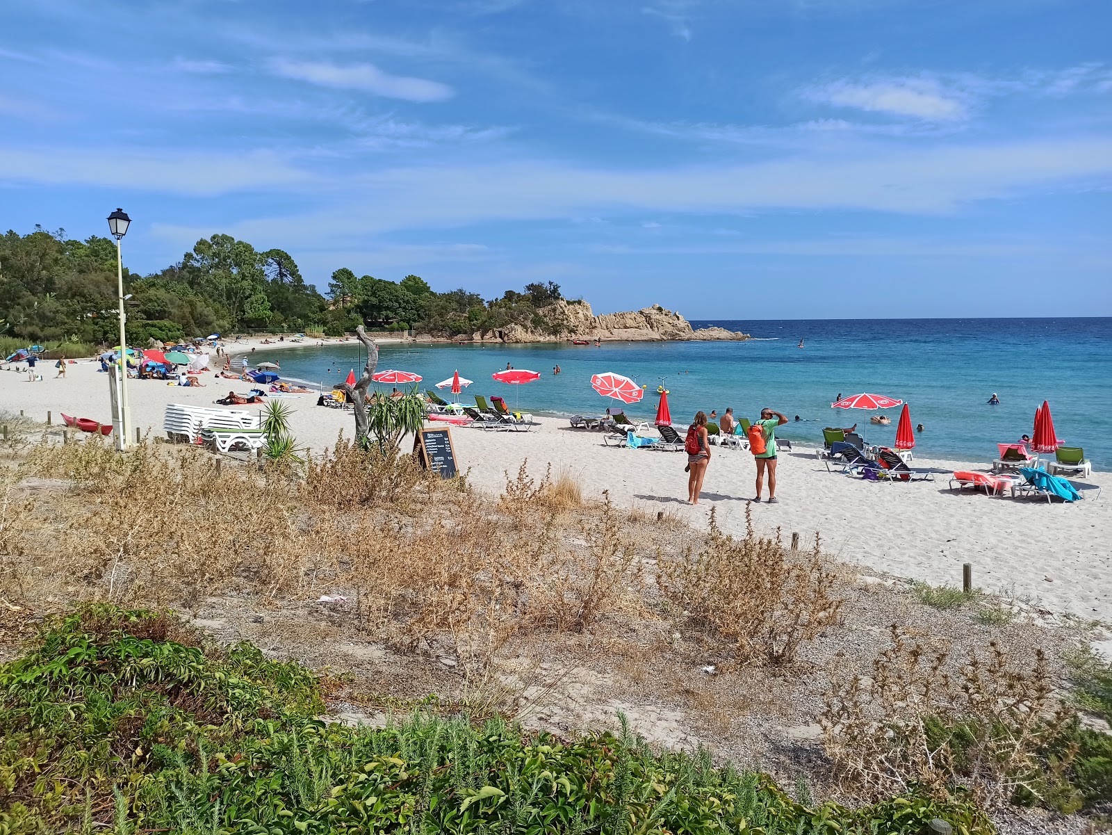 Photo of Plage De Canella with bright sand surface
