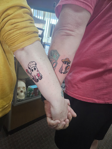 Explore halloween tattoos ideas, creative tattoo ideas in Angola, available at Hoodlum Ink