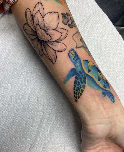 Explore small family tattoo ideas for guys, creative tattoo ideas in Foley, available at Symbolic Ink Tattoo Studio