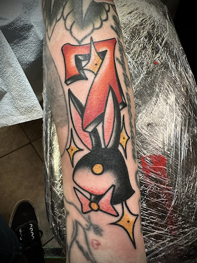 Explore angel numbers tattoo ideas, creative tattoo ideas in New Orleans, available at TOUGH LOVE TATTOOS