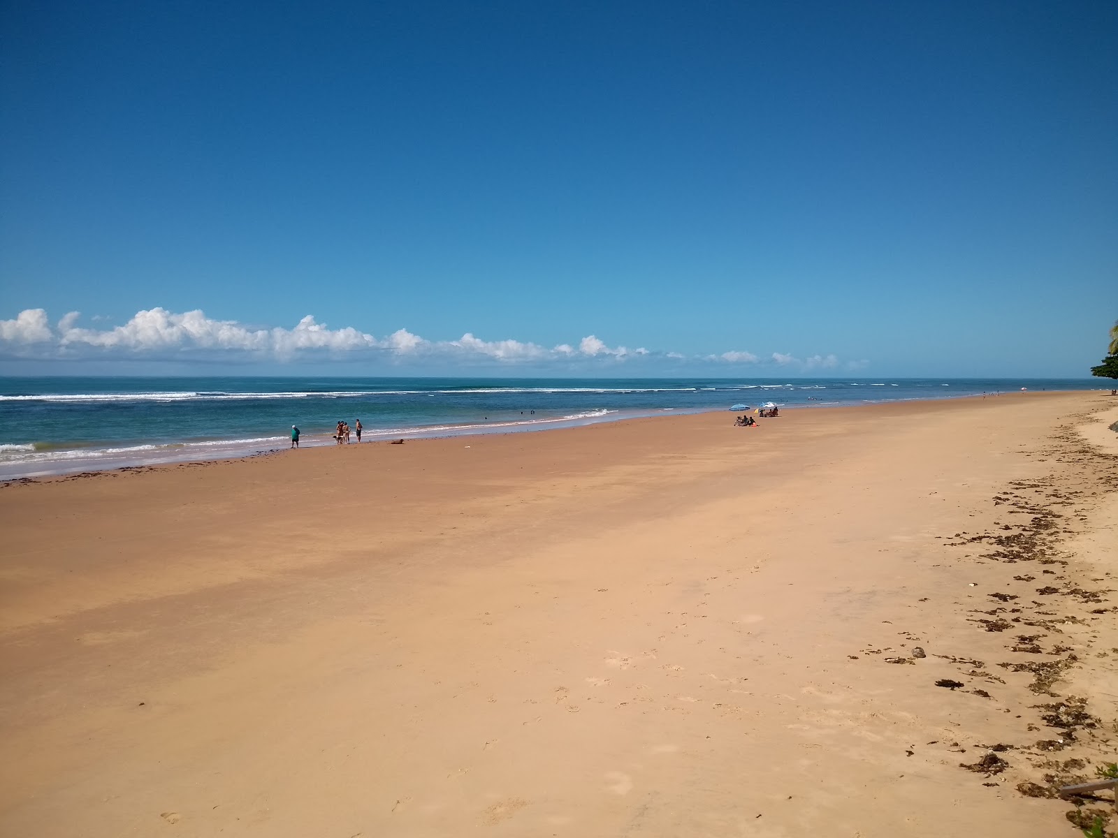 Fotografie cu Plaja Algodoes cu o suprafață de nisip fin strălucitor