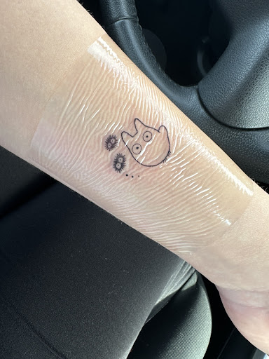 Explore book tattoo ideas for females, creative tattoo ideas in Schaumburg, available at Atmosphere Tattoo Gallery - Schaumburg