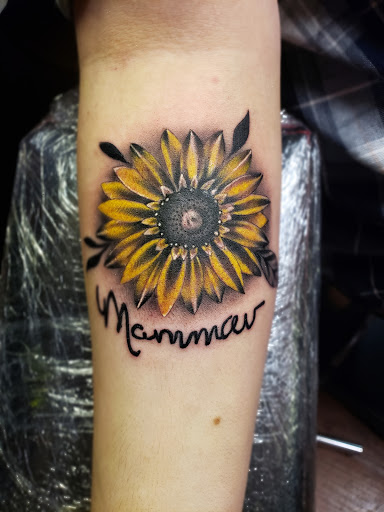 Explore different tattoo ideas for men, creative tattoo ideas in Monroe, available at Vivid Art Tattoos