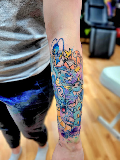 Explore religious tattoo sleeve ideas, creative tattoo ideas in Benton, available at Spectrum Tattoo