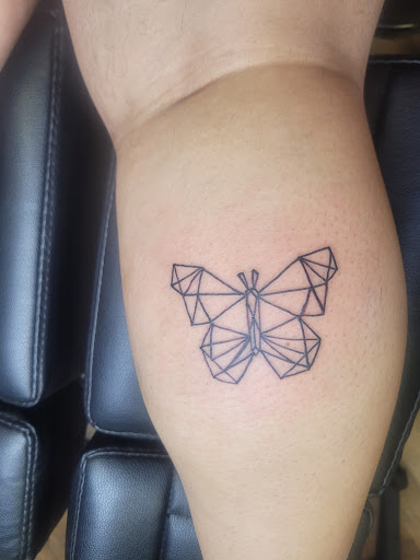 Explore last name back tattoo ideas, creative tattoo ideas in Concord, available at Elysium Ink