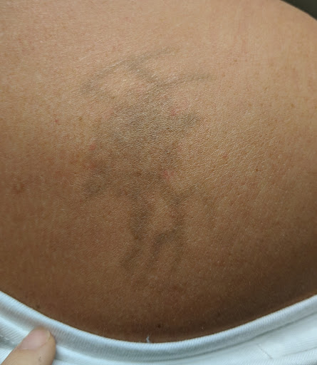 Explore daughter portrait tattoo ideas, creative tattoo ideas in Wichita, available at Evicted Ink Laser Tattoo Removal