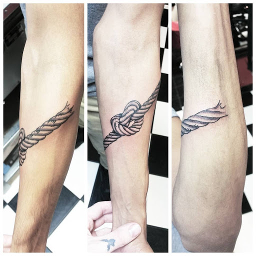 Explore kiss lip tattoo ideas, creative tattoo ideas in Tucson, available at Sacred Art Tattoo Studio