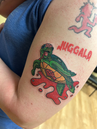 Explore male stomach tattoo ideas, creative tattoo ideas in New Hampton, available at Crescent Moon Tattoo