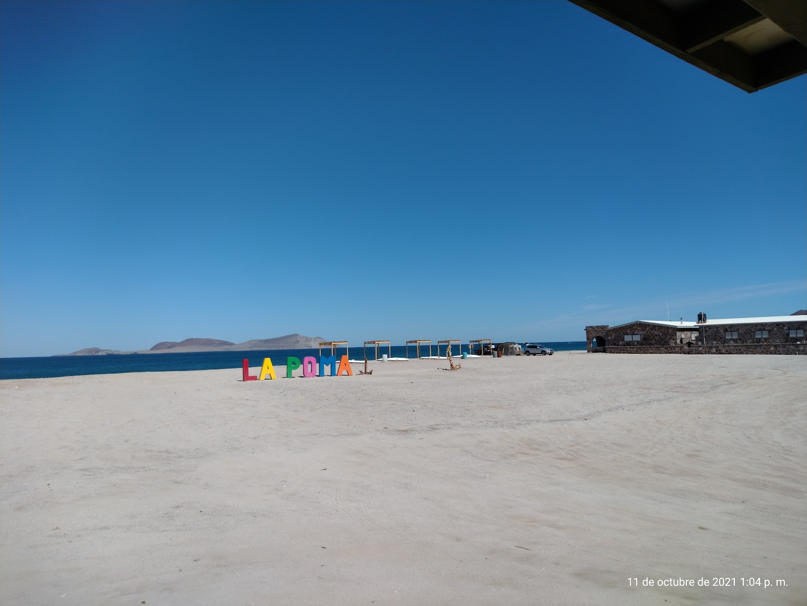 Photo of Playa del Bichi with blue pure water surface