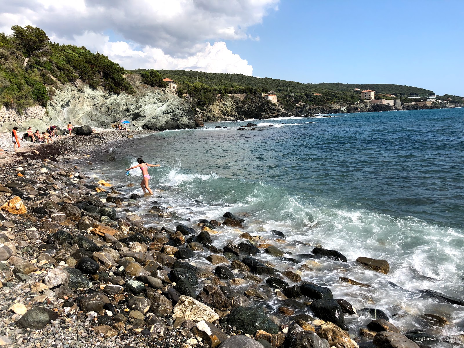 Foto von Baia dell'Arancio mit grauer sand & felsen Oberfläche