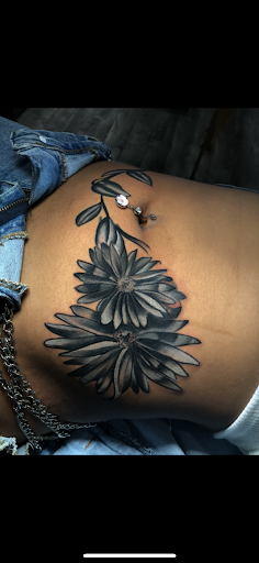 Explore thyroid cancer tattoo ideas, creative tattoo ideas in Atlanta, available at Iron Palm Tattoos & Body Piercing Atlanta