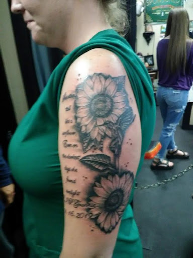 Explore daughters name tattoo ideas for dad, creative tattoo ideas in Ozark, available at Tooth & Nail Tattoo & Piercing