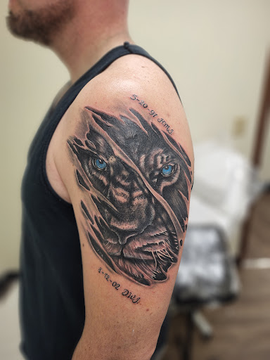 Explore mountain biking tattoo ideas, creative tattoo ideas in Vienna, available at Patriot Arms Ink LLC