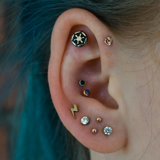 Explore tattoo ideas for october, creative tattoo ideas in Reno, available at Black Hole Body Piercing