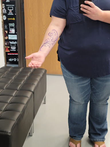 Explore charmed tattoo ideas, creative tattoo ideas in East Lansing, available at Splash of Color Tattoo & Piercing Studio