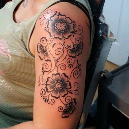 Explore chest and neck tattoo ideas, creative tattoo ideas in Rutherfordton, available at Wicked Needle