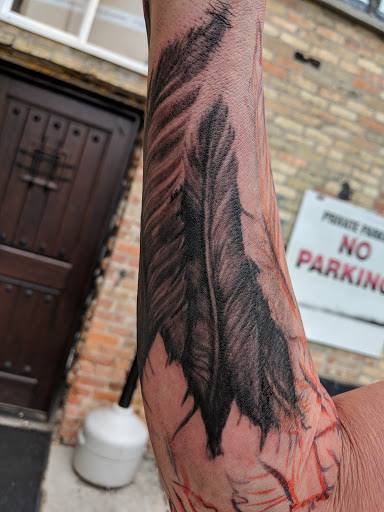 Find ideas for men tattoos for your next unique tattoo in Bay City at Electric Chair Tattoo