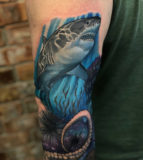 Explore feminine half sleeve tattoo ideas, creative tattoo ideas in Spokane, available at Anchored Art Tattoo