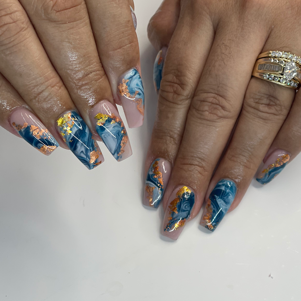 Ichy's Nails and Beaute lounge 33603