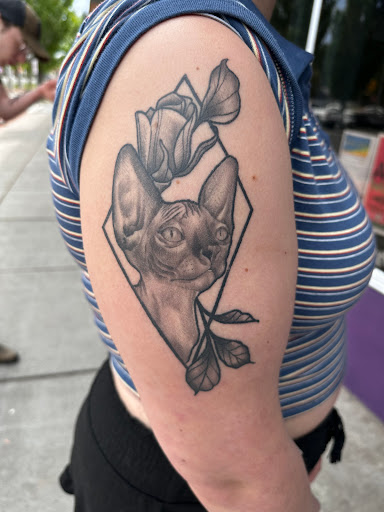 Explore back tattoo for women ideas, creative tattoo ideas in Richland, available at The Green Room Tattoo Lounge