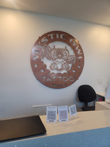 Explore black and white tattoo ideas, creative tattoo ideas in Marietta, available at Mystic Owl Tattoo