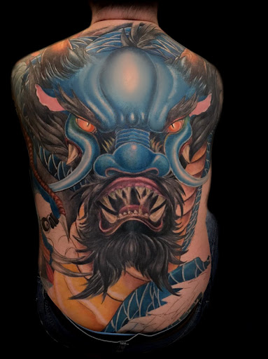 Explore parrot tattoo ideas, creative tattoo ideas in Austin, available at Ink Couture Tattoos