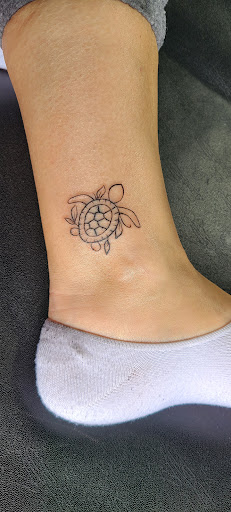 Explore torso tattoo ideas, creative tattoo ideas in Greensboro, available at Cosmic Ink Tattoo Studio