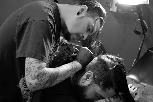 Explore code tattoo ideas, creative tattoo ideas in Taos, available at Muerte Tattoo Taos