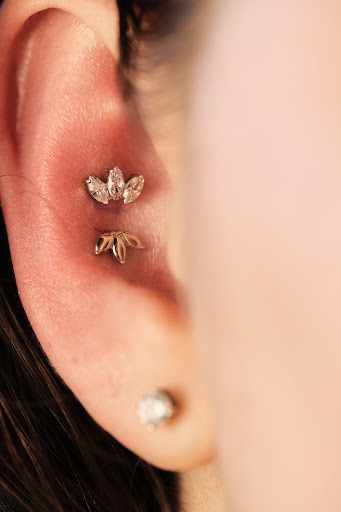 Explore small family tattoo ideas, creative tattoo ideas in Buffalo, available at Moria Piercing and Jewelry