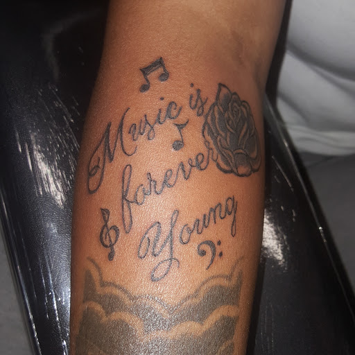 Explore calf tattoo ideas for men, creative tattoo ideas in Raleigh, available at Gifted Styles