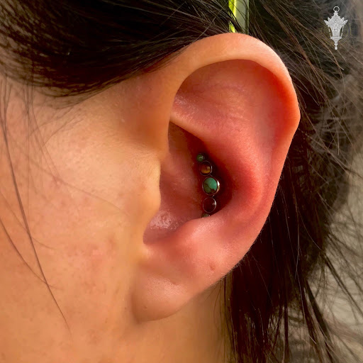 Explore astronomical tattoo ideas, creative tattoo ideas in West Chester, available at Safe Harbor Body Adornment