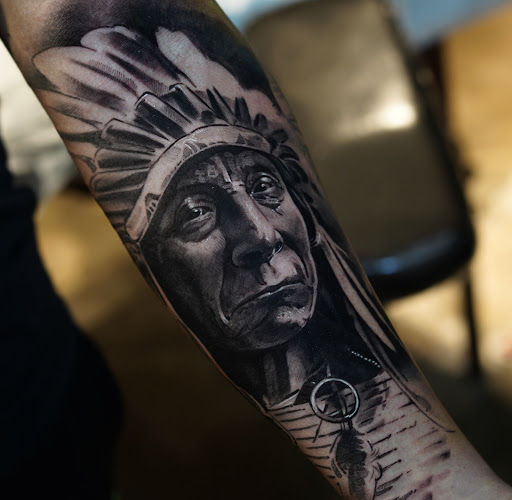 Explore mens ring tattoo ideas, creative tattoo ideas in La Jolla, available at Bay Ink Tattoo & Piercing