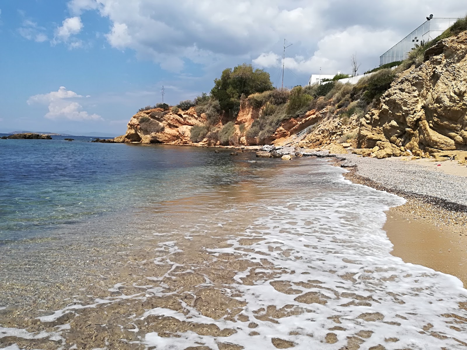 Photo of Kritikos Beach with turquoise pure water surface