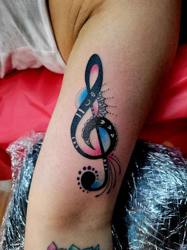 Explore step son tattoo ideas, creative tattoo ideas in Benton, available at Spectrum Tattoo