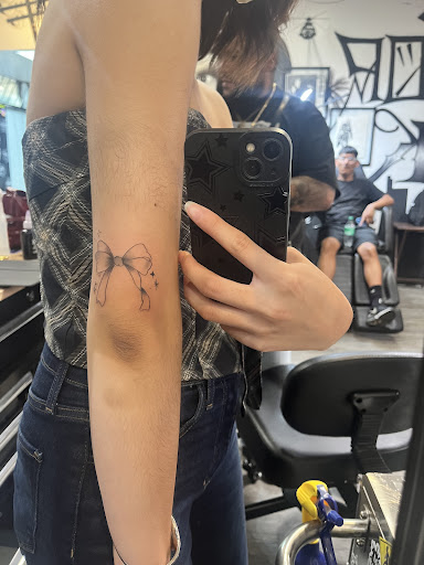 Explore torn skin tattoo ideas, creative tattoo ideas in Downey, available at Superior Ink Tattoo and Piercings