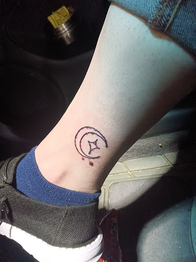 Explore tattoo ideas for new dads, creative tattoo ideas in Denison, available at Mad House Tattoos