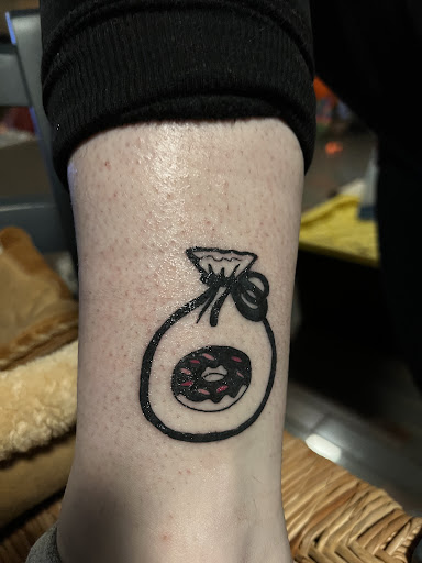 Explore neon tattoo ideas, creative tattoo ideas in Bensalem, available at Electric Honor Tattoo Co.