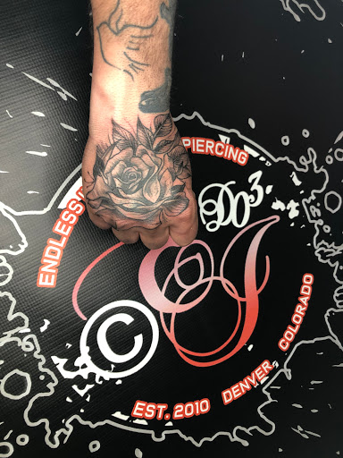 Explore blackout cover up tattoo ideas, creative tattoo ideas in Denver, available at Endless Ink Tattoo & Piercing