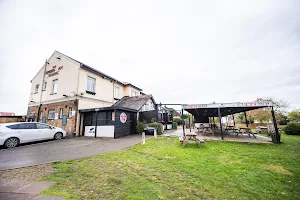 OYO The Green Man Pub And Hotel image