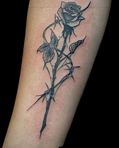 Explore back of the leg tattoo ideas, creative tattoo ideas in Columbus, available at Infamous Ink Tattoos and Piercings